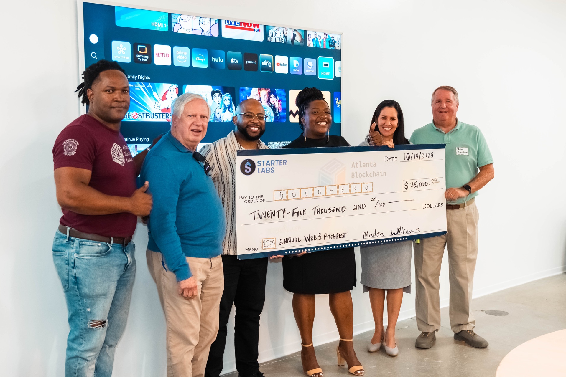 DocuHero accepting the $25,000 Web3 PitchFest check