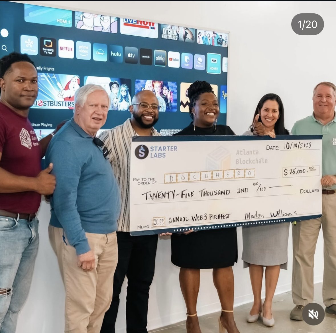 Tia Williams accepting the DocuHero PitchFest check